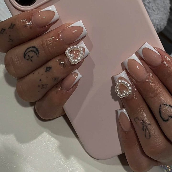 Artificial nails with elegant heart decorations Bowlift