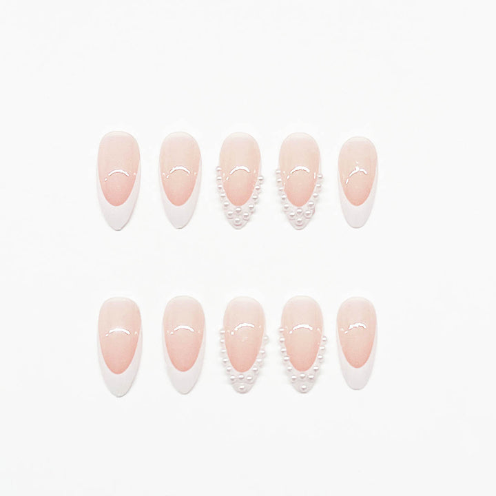 Nail art set with elegant design and 3D pearl embellishments Bowlift
