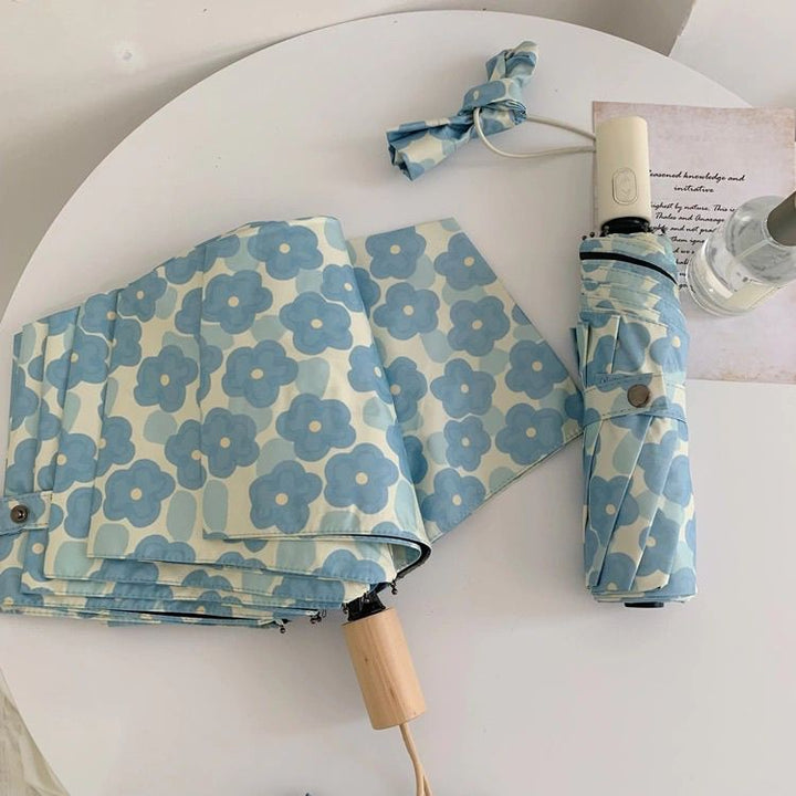 Women Folding Umbrella with Floral Pattern Bowlift
