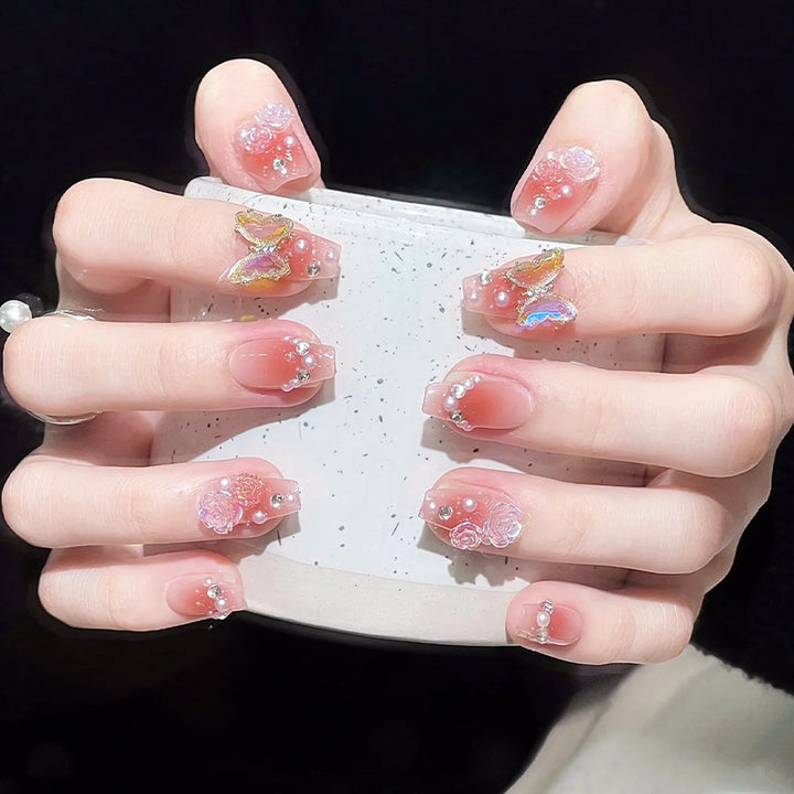 Artificial artificial nails with heart design and glitter details Bowlift