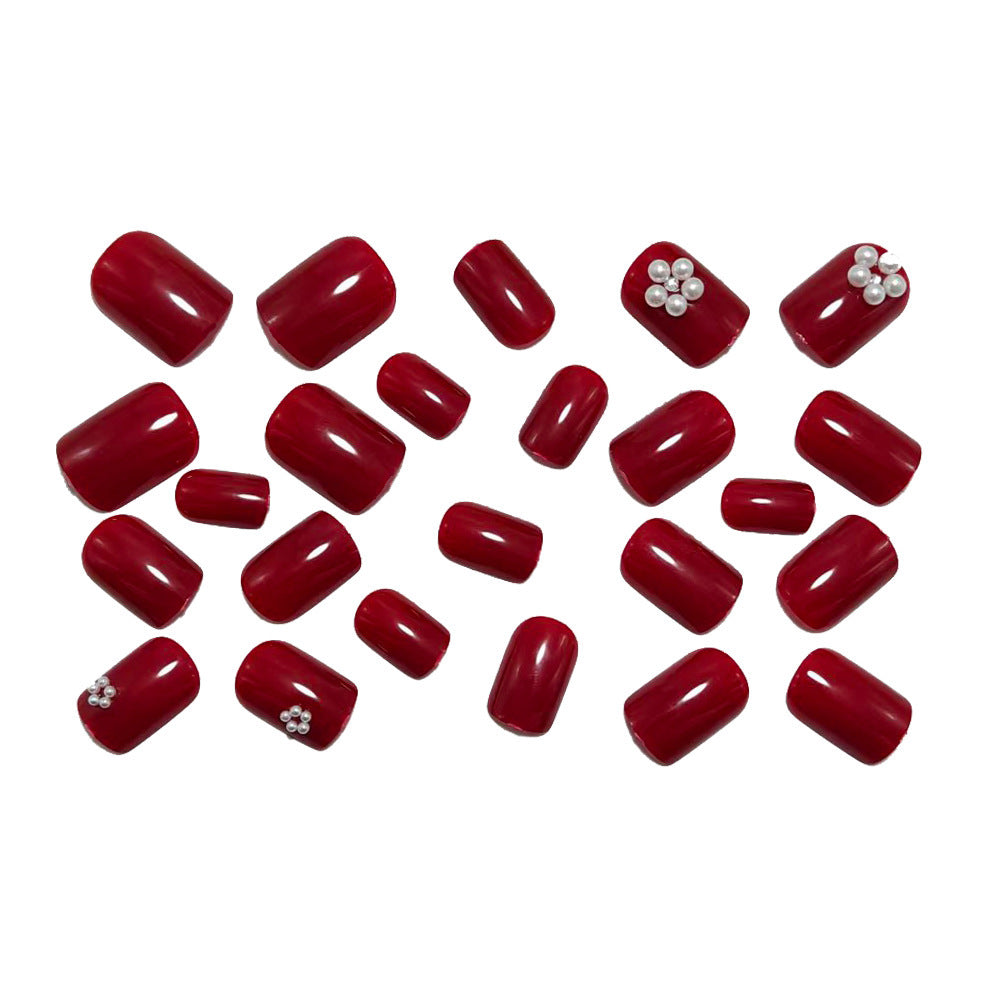 Elegant artificial nails with shimmering rhinestone embellishments Bowlift