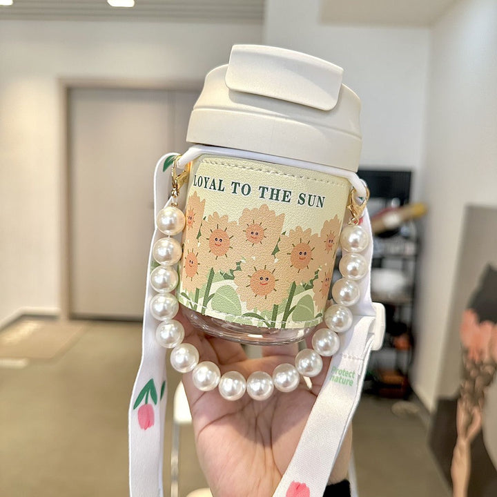 Women's insulated bottle with practical pearl carrying strap Bowlift