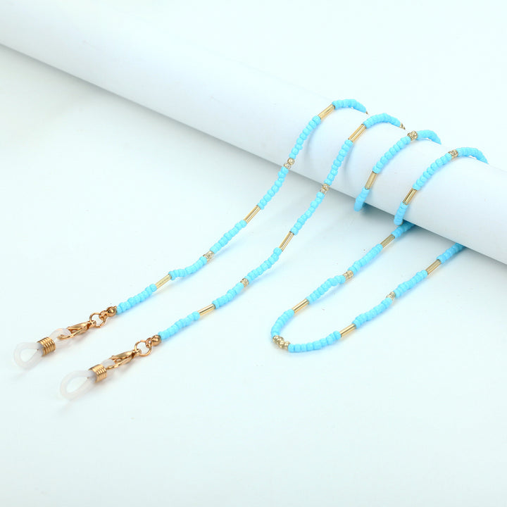 Chains-Necklace Made of Fine Pearls and Golden Accents Bowlift
