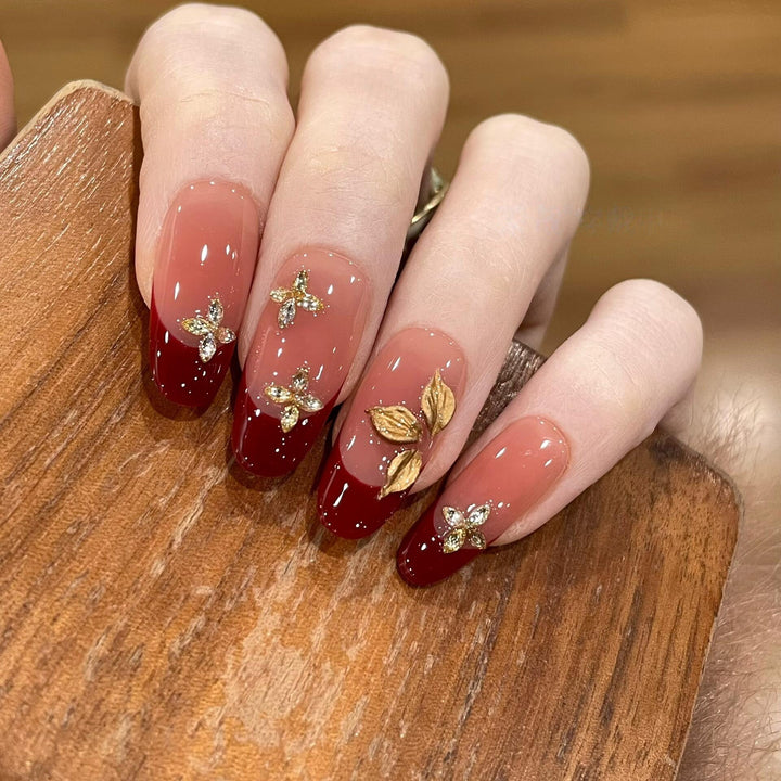 Artificial nails with luxurious flower and glitter elements Bowlift