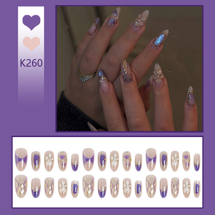 Artificial nail set with elegant flower and glitter details Bowlift