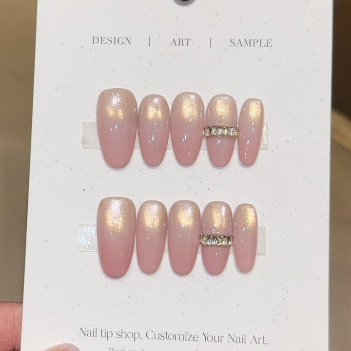 Glamorous artificial nails with elegant glitter and rhinestone application Bowlift