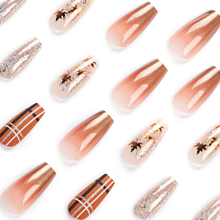 Artful nail extensions with glitter and leaf patterns Bowlift