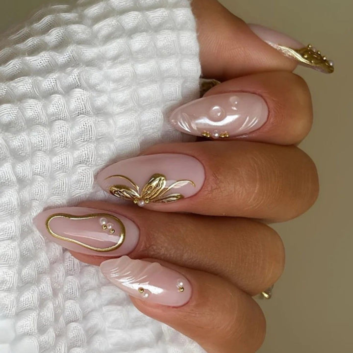 Artful acrylic nails with elegant floral accents Bowlift