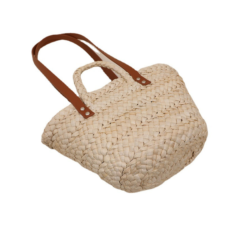 Handcrafted straw bag with sturdy leather handles Bowlift