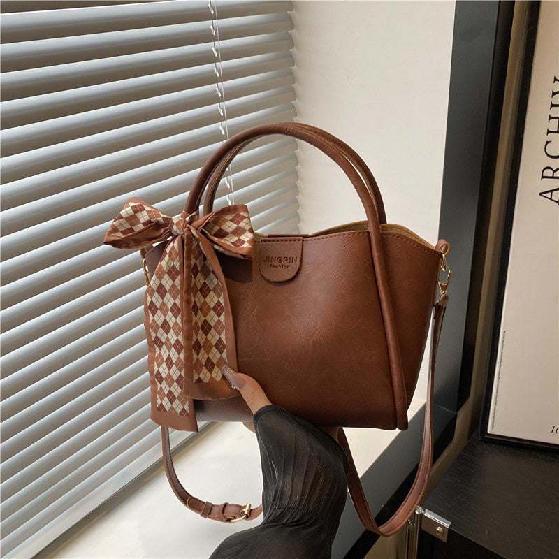 Elegant Bow Accent Handbag Bowlift