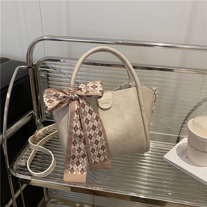 Elegant Bow Accent Handbag Bowlift