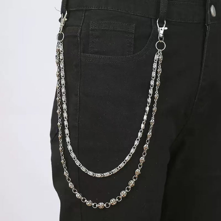 Fashionable chain belt with decorative pendants Bowlift