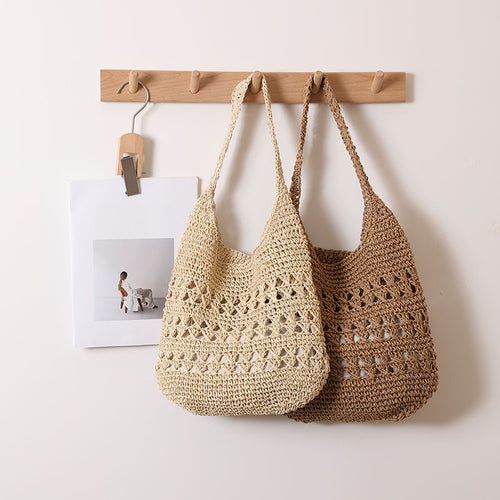 Crocheted shoulder bag with decorative hole pattern Bowlift