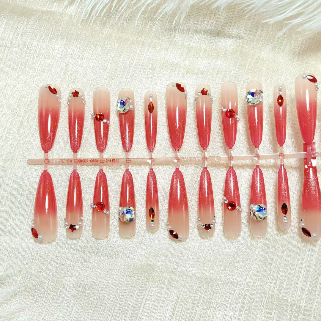 Glamorous artificial nails with sparkling ombre effect and elegant embellishments Bowlift