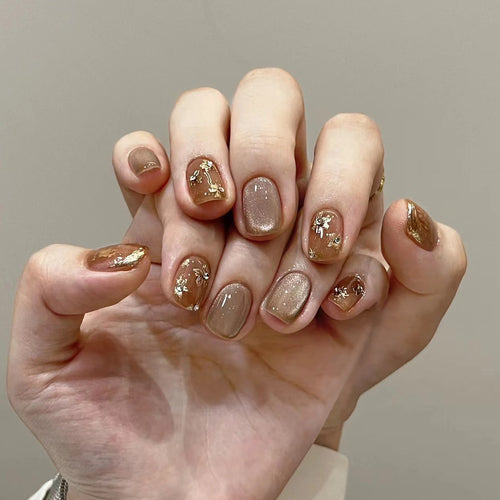 Elegant Nail Decoration with Glitter and Floral Accents Bowlift