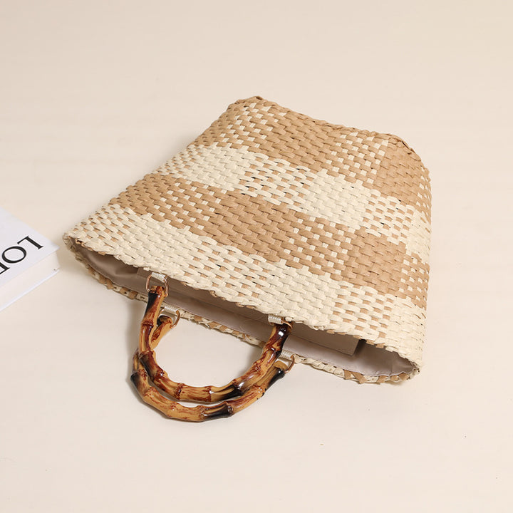 Braided bast bag with bamboo handle and decorative lining Bowlift