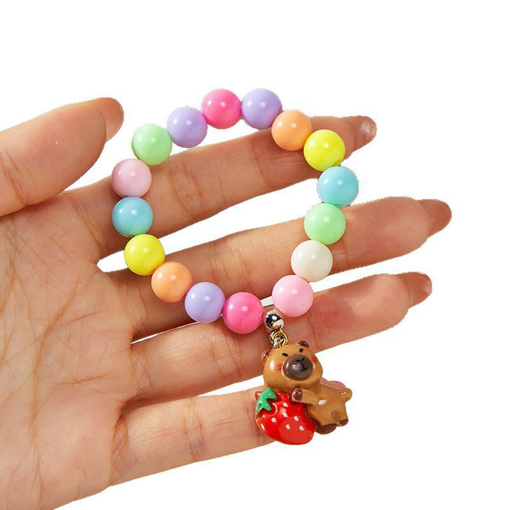 Colorful children's bracelet with crafted pendant Bowlift