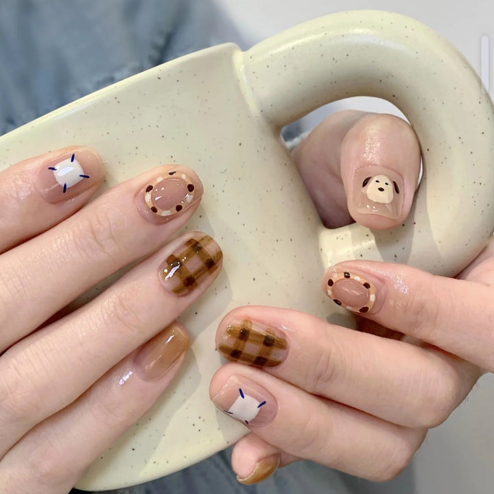 Playful artificial nails with cute animal and pattern accents Bowlift