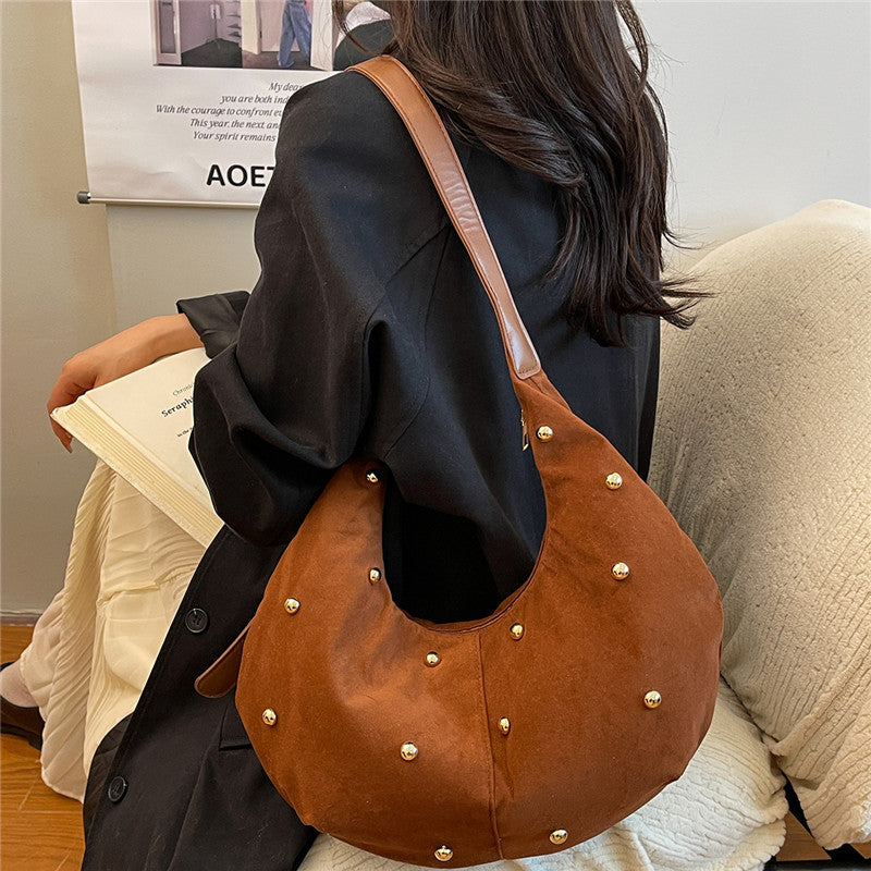 WoTextured Suede Hobo Bag with Decorative Studs Bowlift
