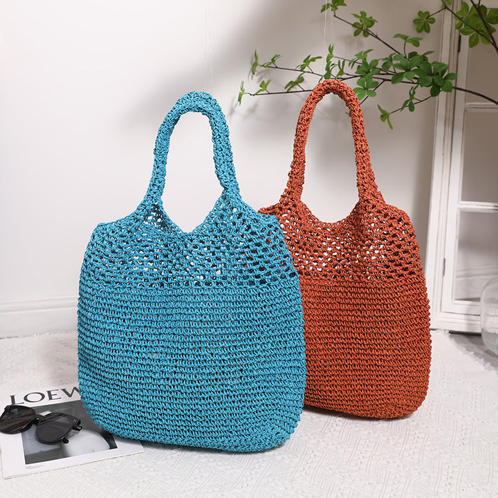 Handcrafted straw bag with wide carrying handle Bowlift