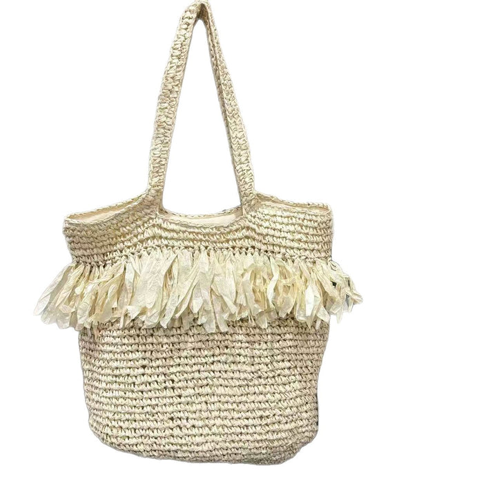 Straw bag with fringes and modern details Bowlift