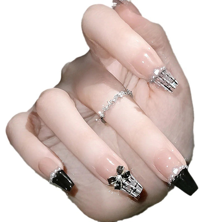 Glamorous artificial fingernails with glitter and moon designs Bowlift