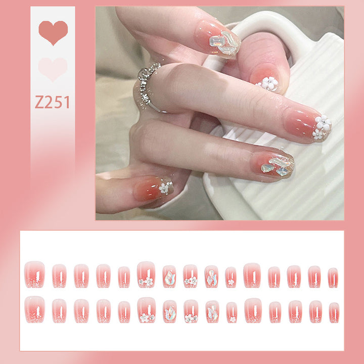 Artificial nail set with floral 3D decorations and elegant glitter Bowlift