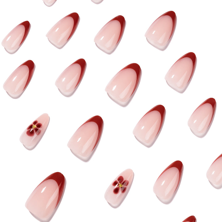 Elegant and artistically designed stiletto nails with flower design Bowlift