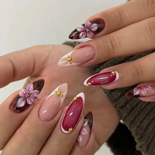 Artificial nails with floral 3D designs and elegant accents Bowlift
