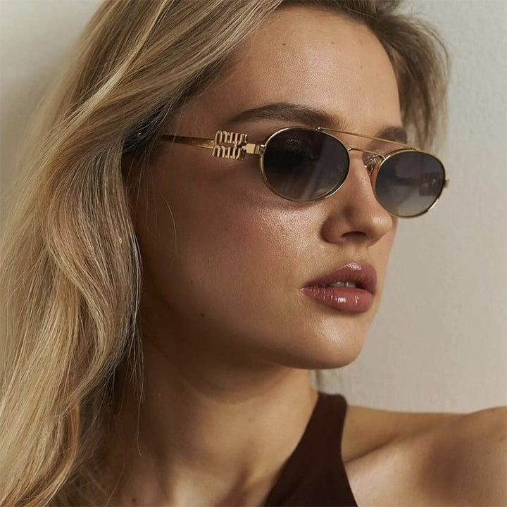 Women's elegant oval sunglasses with luxurious metal frame Bowlift