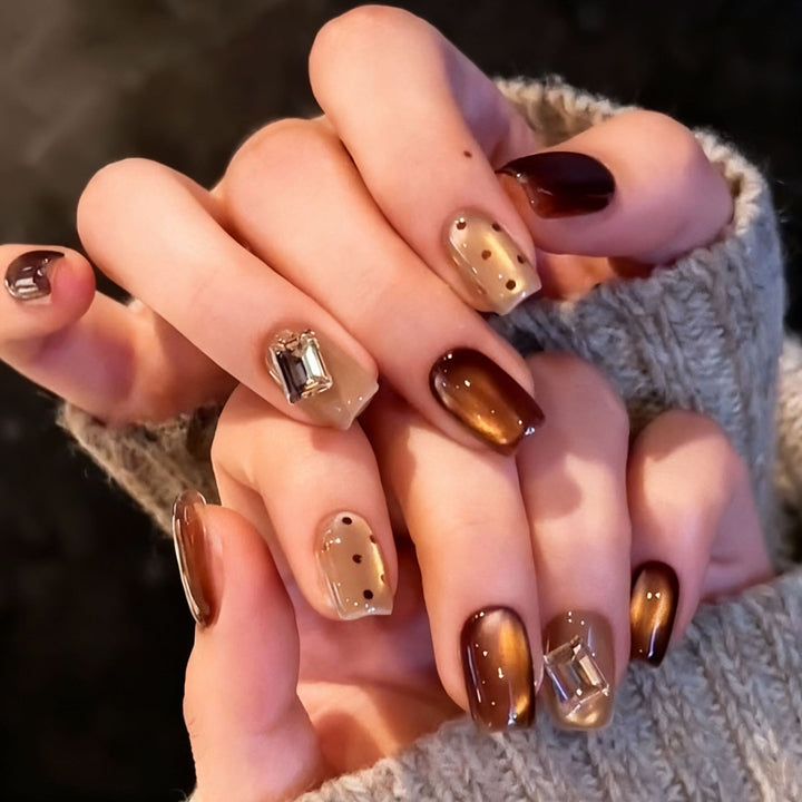 Acrylic nail set with elegant ombre designs and sparkling accents Bowlift