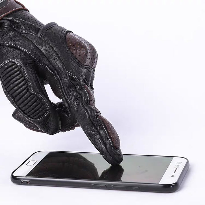 Perforated leather motorcycle gloves with reinforced knuckle armor and touchscreen fingertips Bowlift