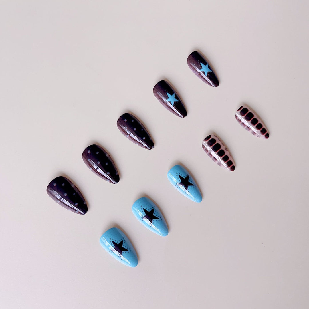 Artificial nail set with creative patterns and playful accents Bowlift
