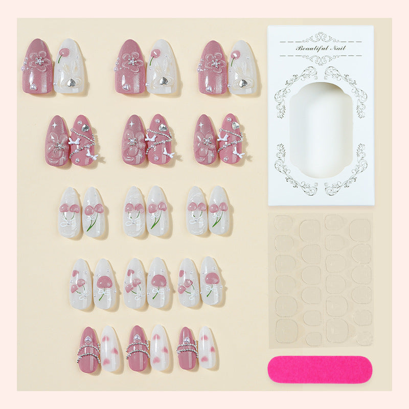 Artificial nail set with decorative floral motifs and glamorous accents Bowlift