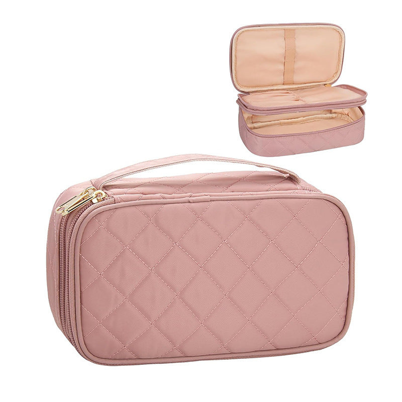 Cosmetic storage bag with elegant quilted pattern Bowlift