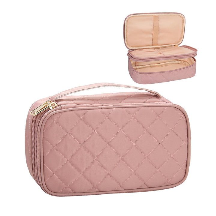 Cosmetic storage bag with elegant quilted pattern Bowlift