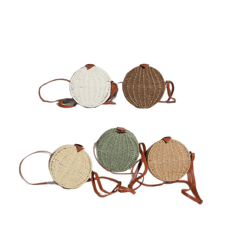 Round basket bag with leather accents Bowlift