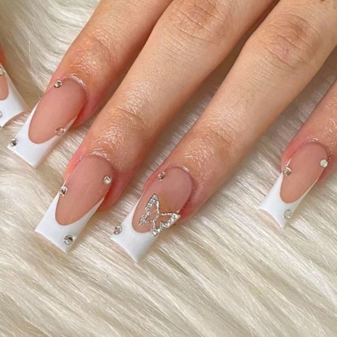 Elegant Stiletto Nail Extensions with Rhinestone Accents Bowlift