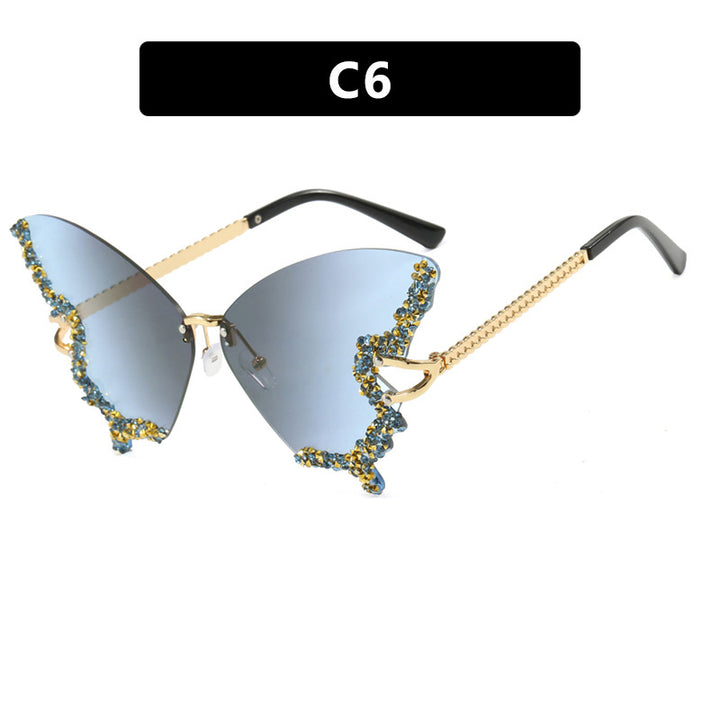 Women's large cat-eye sunglasses with sparkling rhinestone embellishment and elegant frame Bowlift