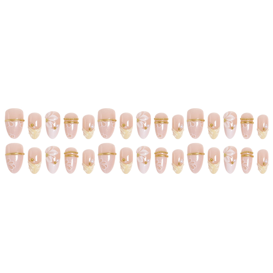 Artificial nail set with enchanting floral details and luxurious gold accents Bowlift