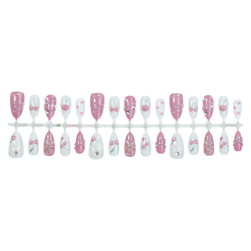 Artificial nail set with decorative floral motifs and glamorous accents Bowlift