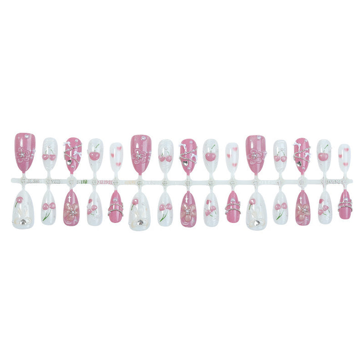 Artificial nail set with decorative floral motifs and glamorous accents Bowlift
