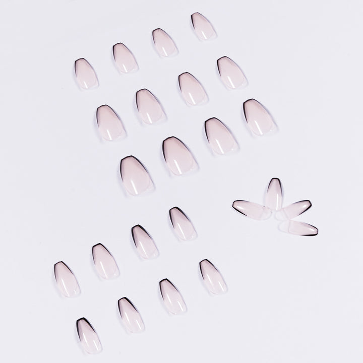 Artful stiletto nails with elegant black tip decoration Bowlift