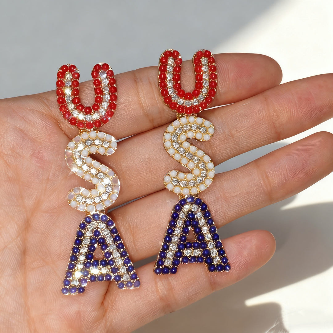 Women’s sparkling statement earrings with crystal beads and gold-plated setting Bowlift
