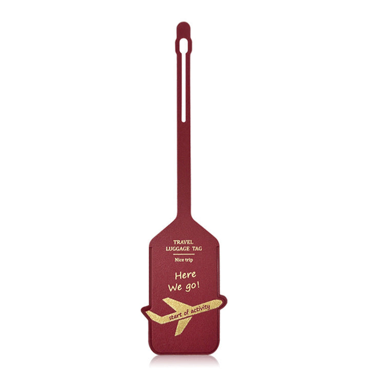premium leather travel luggage ID tag with embossed airplane motif and adjustable strap Bowlift