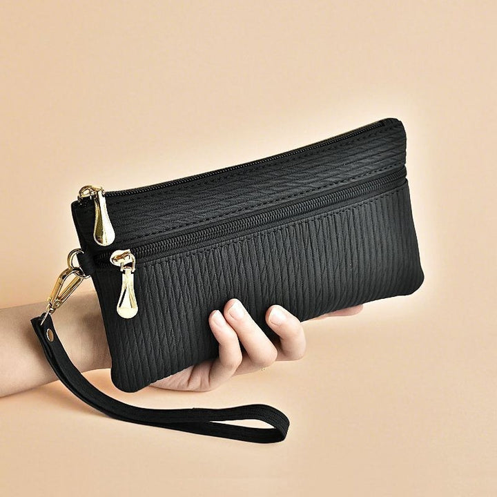 Elegant Clutch With Practical Wrist Strap Bowlift