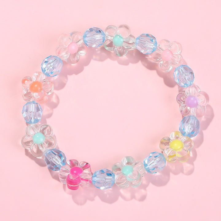 Friendship bracelet with colorful flower motifs Bowlift