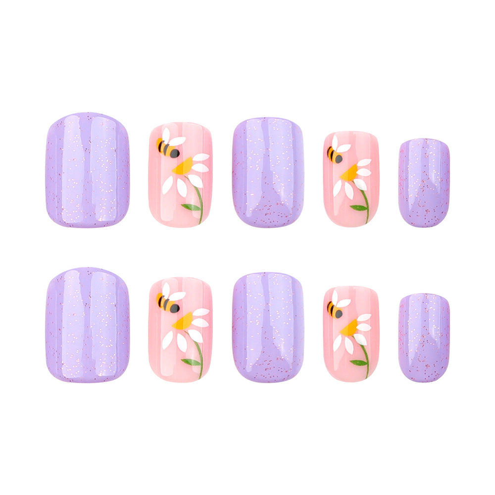 Artfully designed nail extensions with flower design Bowlift