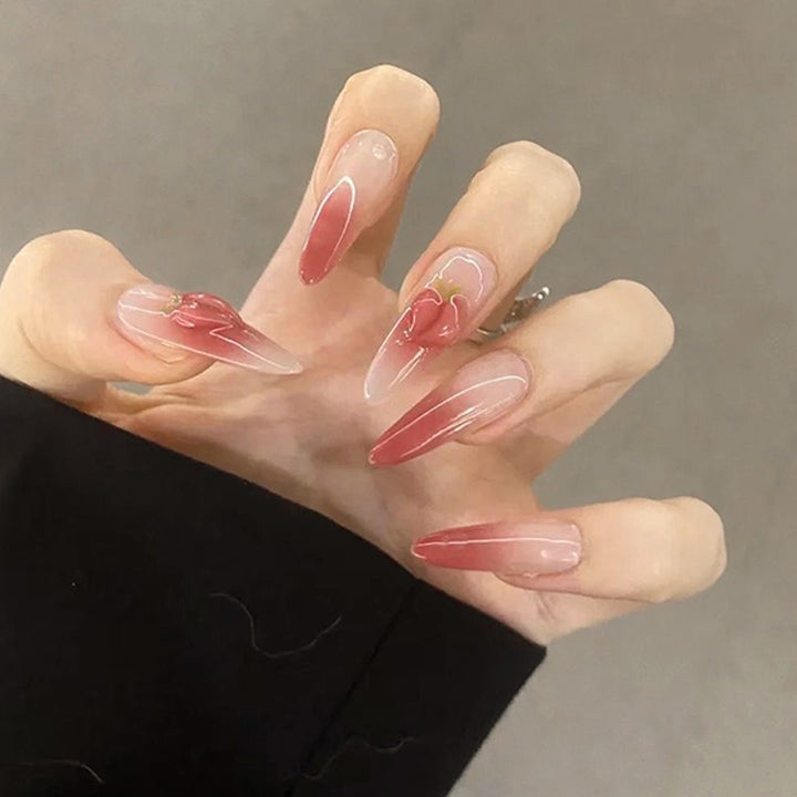 Nail set in elegant ombre design with artistic accents Bowlift