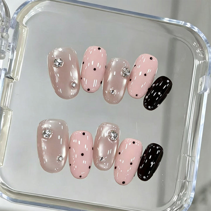 Acrylic nail set with glamorous rhinestone accents and modern dots Bowlift